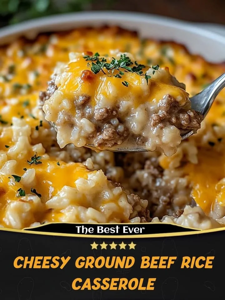 Cheesy ground beef rice casserole served in a dish with melted cheese on top.