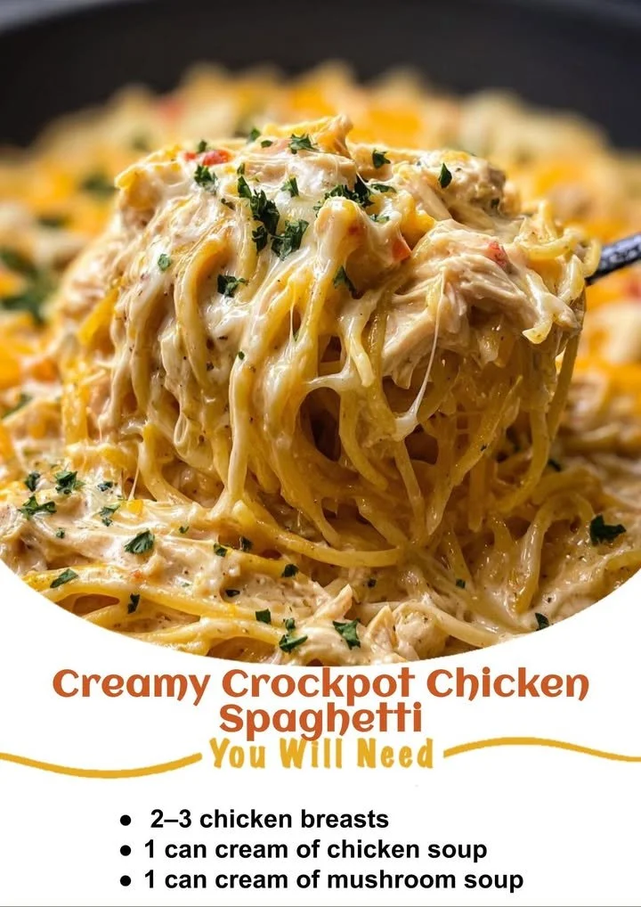 Creamy crockpot chicken spaghetti in a bowl with herbs and cheese