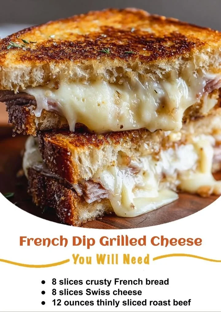 Delicious French Dip Grilled Cheese sandwich with melted cheese and beef dip.