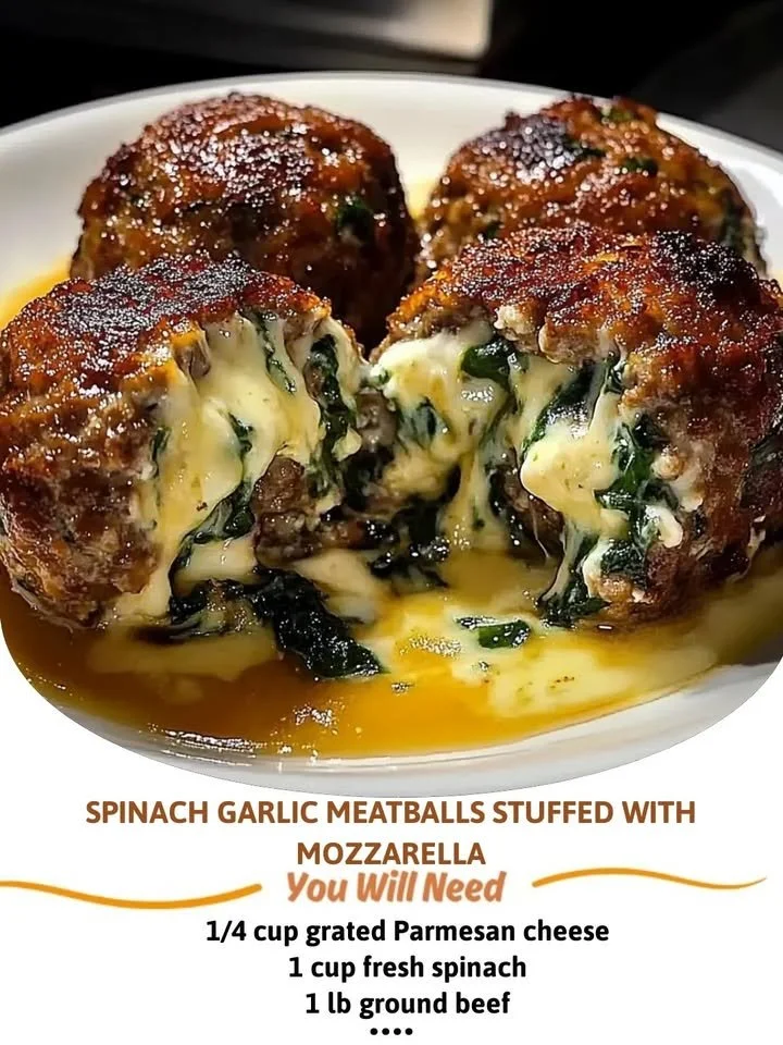 Spinach garlic meatballs stuffed with mozzarella served on a plate
